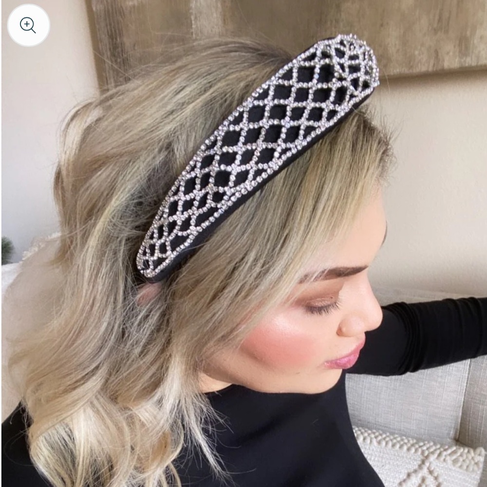 Black headband filled with sparkly rhinestones